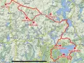 Mapa z zaznaczonymi trasami motocyklowymi na Warmii i Mazurach, z widocznymi jeziorami i nazwami miejscowości.