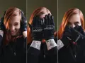 Kobieta z rudymi włosami w czarnych rękawicach motocyklowych zakrywa twarz.