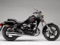 Czarny motocykl Kymco Zing 125, idealny do miasta. Sprawdź kymco zing 125 dane techniczne.