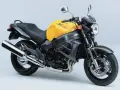 Żółty motocykl Honda X11, klasyczny naked bike. Dane techniczne tego modelu to moc i zwinność.