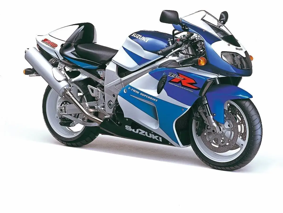 Suzuki TL1000R, sportowy motocykl z niebiesko-białymi akcentami, gotowy do jazdy po torze.